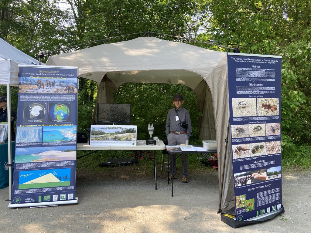 Pete Dang and the BCI exhibit at Pollinator Appreciation Day.
